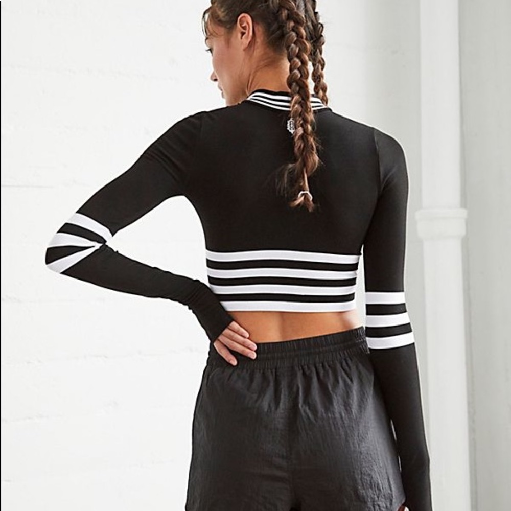 FREE PEOPLE “Triumph Stripe Turtleneck”